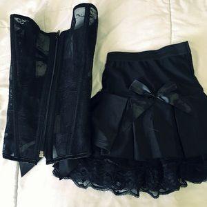 Black mesh corset and mini skirt